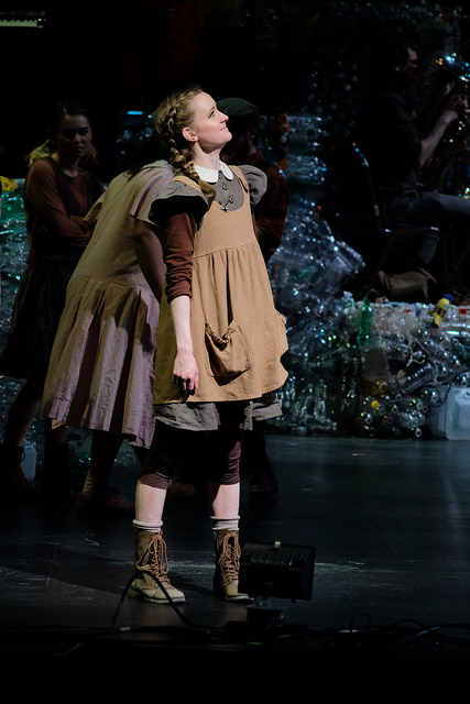 Jenna Craig playing the lead role of "Little Sally" in Urinetown: The Musical