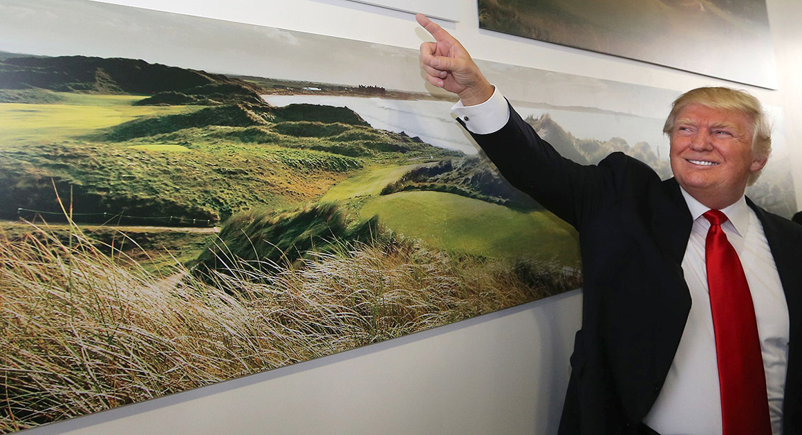 A permit application for a sea wall around one of Donald Trump's golf courses explicitly names global warming as a reason to build the wall. | AP Photo