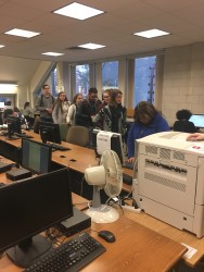 Students crowd around one printer at the Potter Library. PHOTO/Raechel Sontag